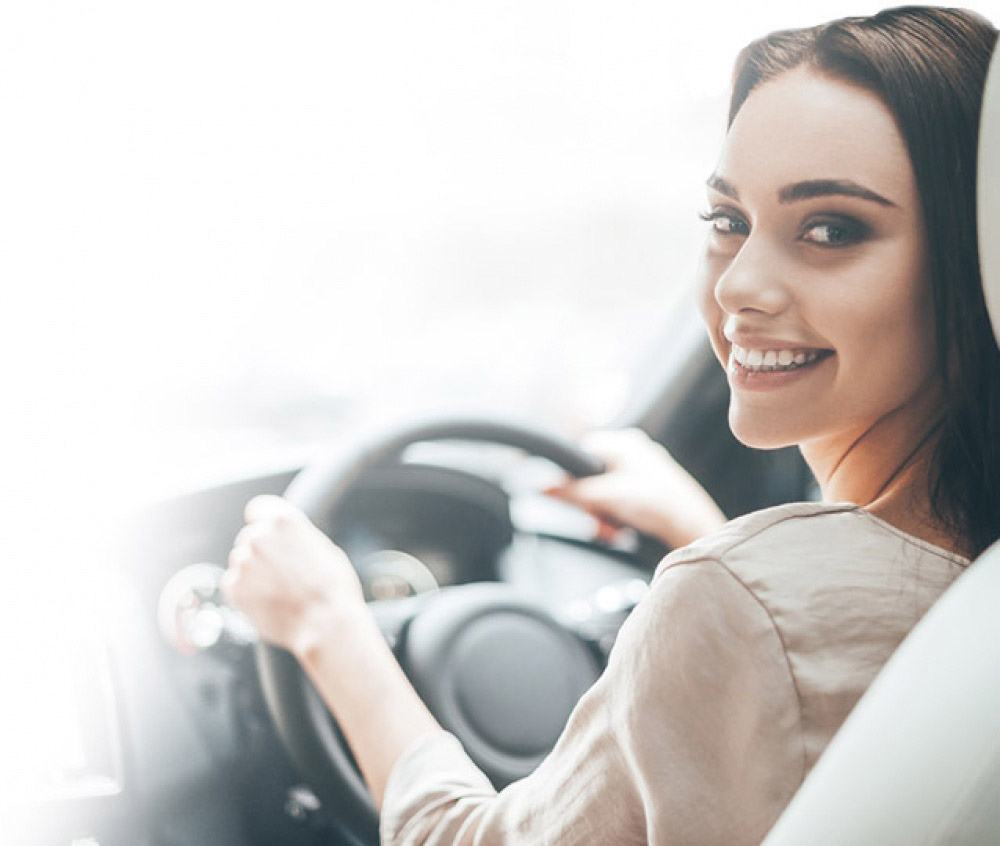 Woman driving her car