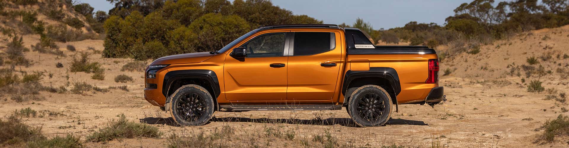 Mitsubishi Triton 2024 side view